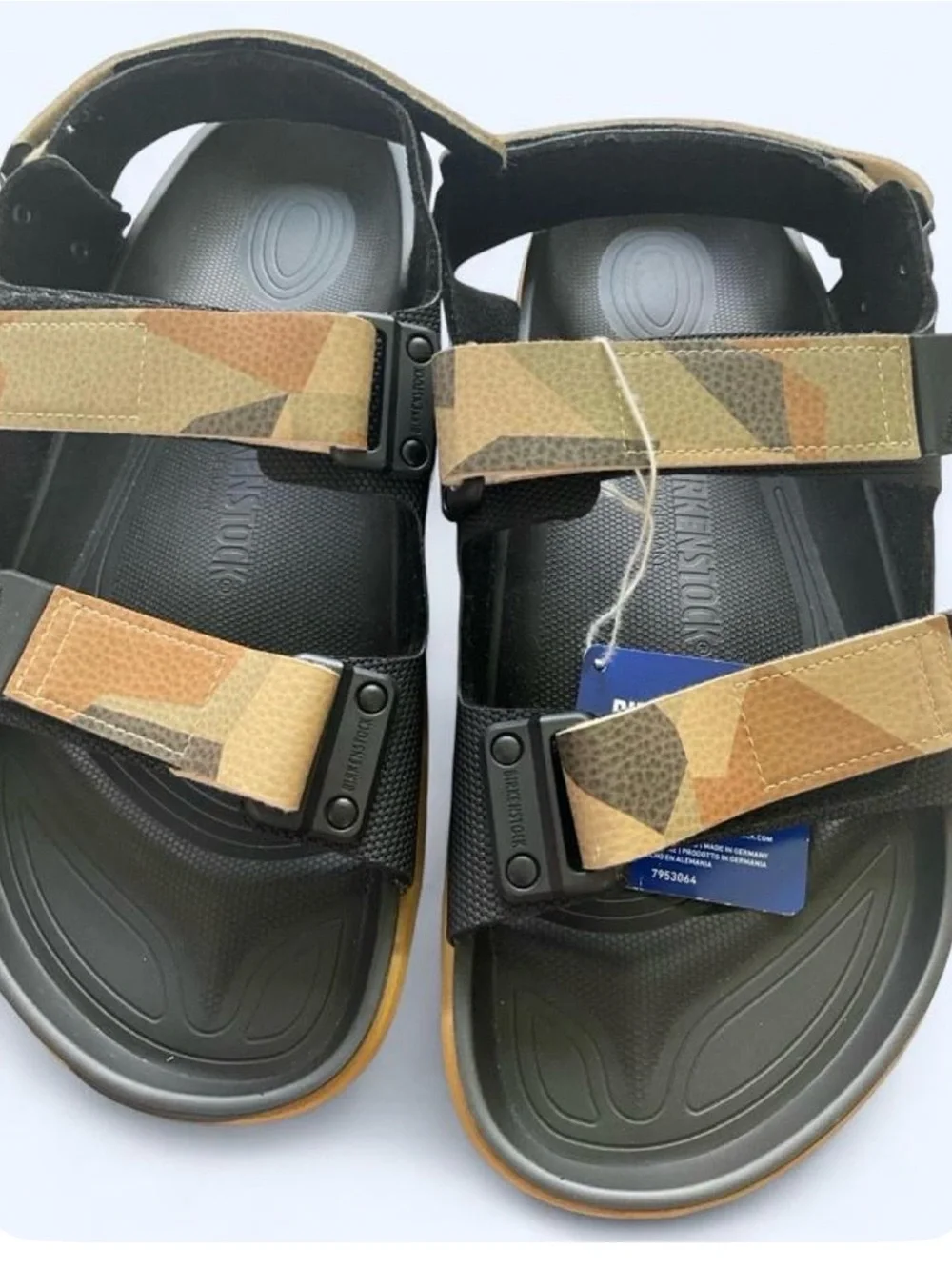 Birkenstock Men’s Black Slides with Tan Accent Strap